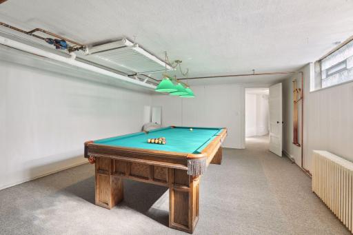 Bonus lower level with space for billiards.