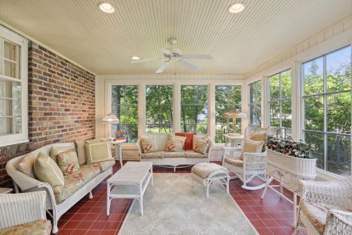 Inviting four season porch with heated floors and large operable windows to maximize fresh air in the summertime. A true outdoor living room that can be enjoyed year round with privacy and views into the level yard and gardens.