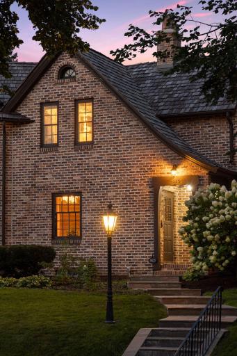 Well lit front walk and covered entry. This home is gracious and thoughtful in every way.