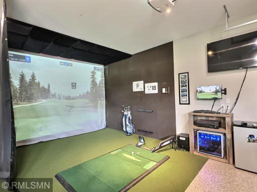Calling all avid golfers, or anyone that wants to learn. This golf simulator will stay with the sale of the home, you'll become a pro!