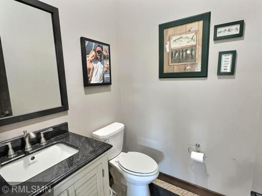 View of the half bathroom in the detached double garage, perfect during outside parties...or anytime really!