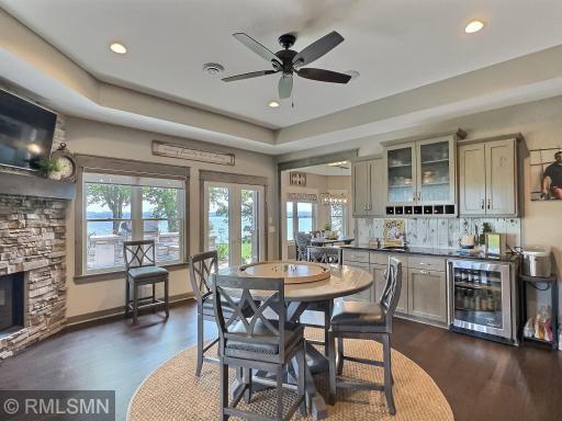 Warmed by a gas fireplace with views of Sugar Lake, the family room will certainly be a hit by all your weekend guests.