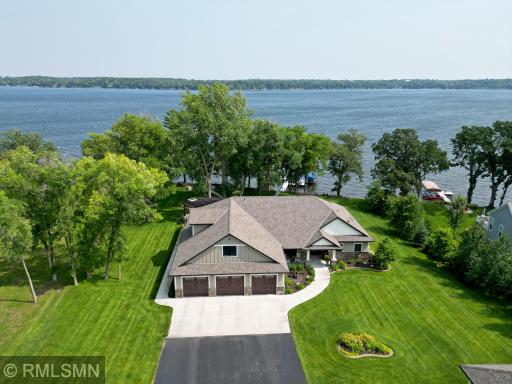 This luxurious waterfront home is set on the shores of Sugar Lake, imagine a weekend spent with family and friends here.