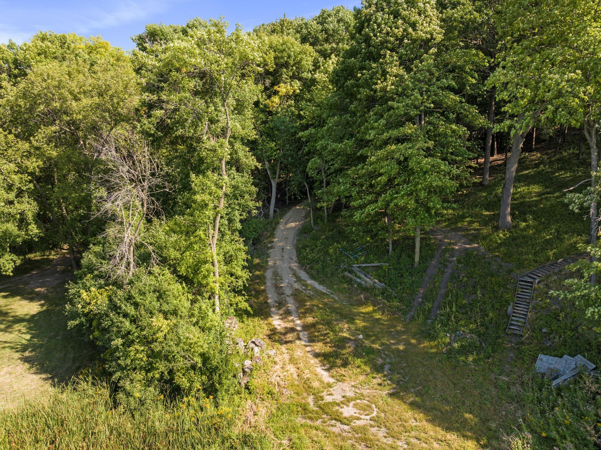 Two ways down to the lake, cart path, or staircase