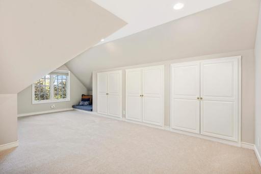Upstairs bedroom, lots of storage and nice natural lighting.