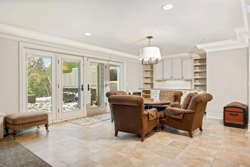 Walkout lower level, room for entertaining, easy access to backyard patio, dry bar with refrigerator and freezer drawers, wine closet.