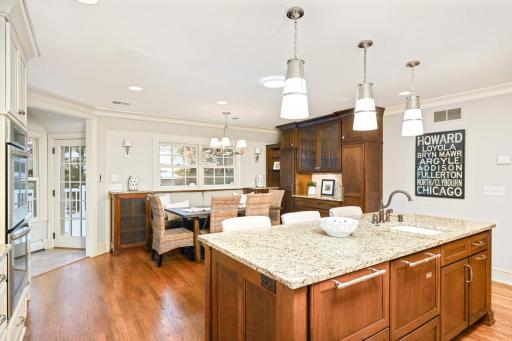 Nice open space in the kitchen, room to cook and entertain. Designated eat in area. Back door opens to deck, tile near door is heated.
