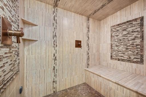 Lower level, massive and luxurious steam shower! How lovely for cold winter nights!