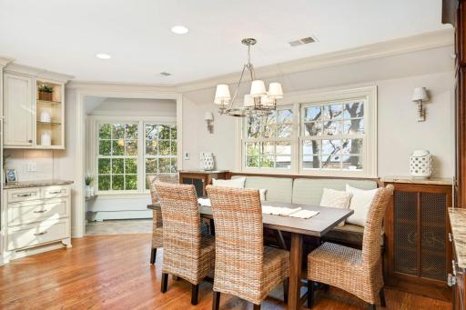 Light and bright kitchen eating area. Access to deck from back door.