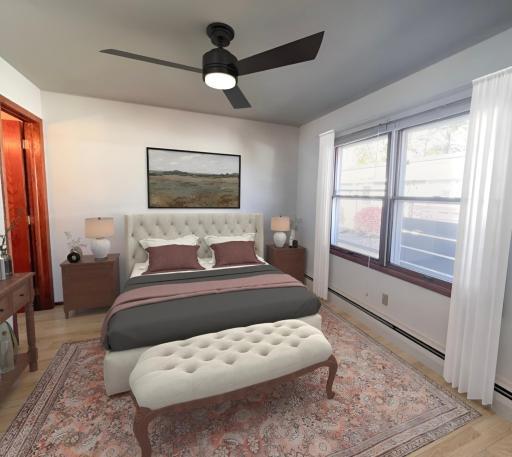 Primary Bedroom with 3/4 Bath (virtually staged) Ceiling fan and flooring virtually added.