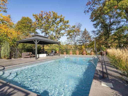 Fabulous salt water pool with extensive decking and Gazebo.