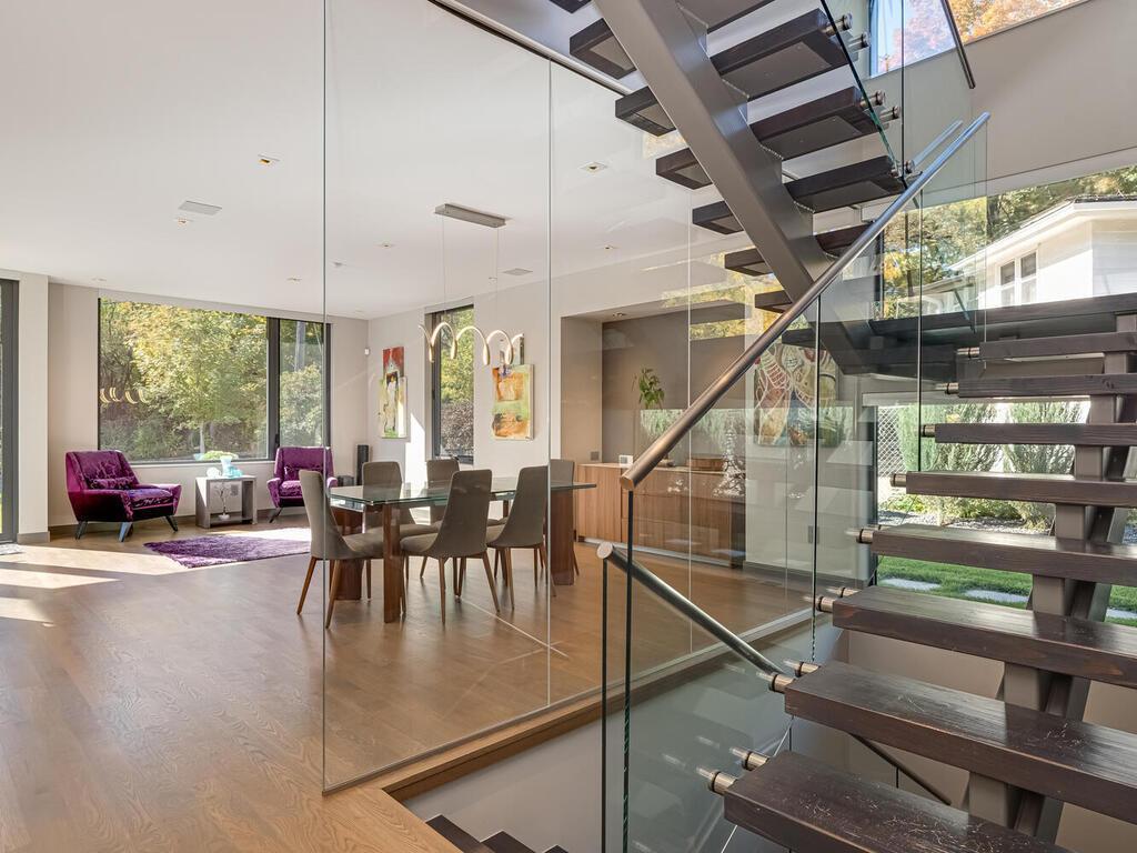 Breathtaking glass floating stairway.