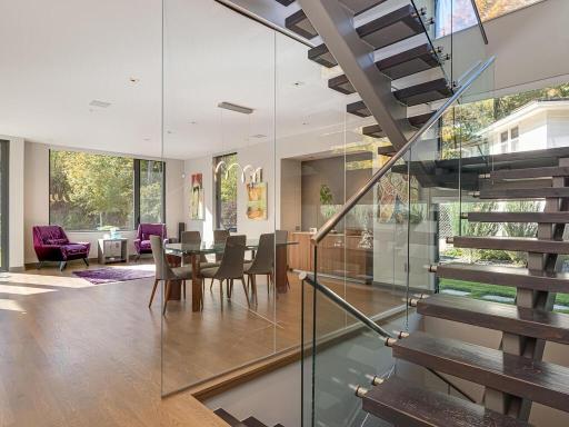 Breathtaking glass floating stairway.