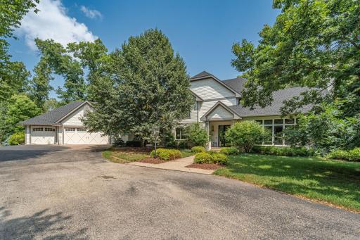 front exterior with mature trees