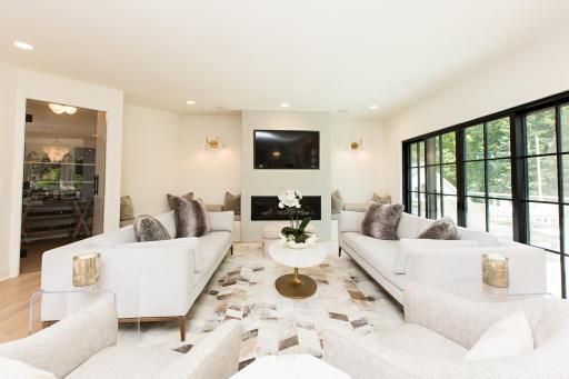 Living room open to kitchen with wine room access.jpg