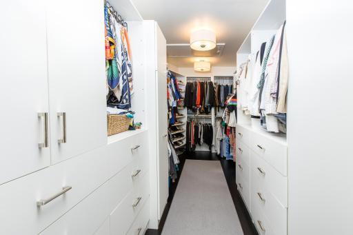 Primary bedroom's large walk-in closet .jpg