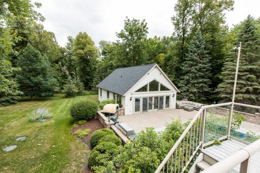 Deck with views of guest house and pool.jpg