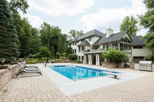 Back exterior with pool and a view.jpg