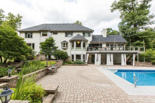 Back exterior and stone deck/patio.jpg