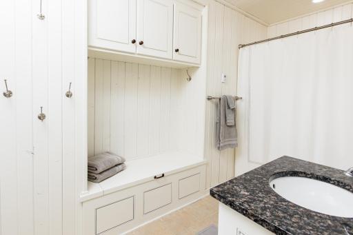 Plenty of storage for towels in guest house bathroom.jpg