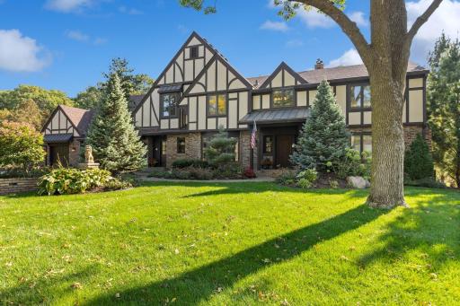 Welcome to 6316 Westwood Court! Exceptionally maintained Tudor style two story in demand Parkwood Knolls.