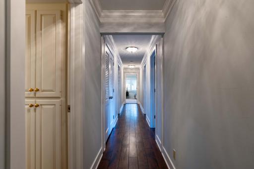 bedroom hallway with wide plank walnut flooring
