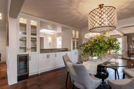 custom storage and wine cooler in formal dining