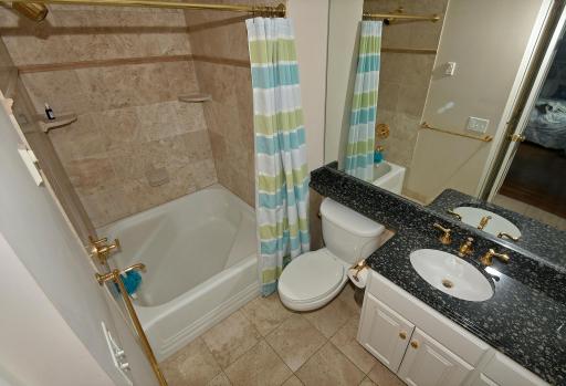 second ensuite bath with princess tub and shower
