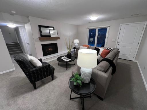 gas fireplace in lower level family room