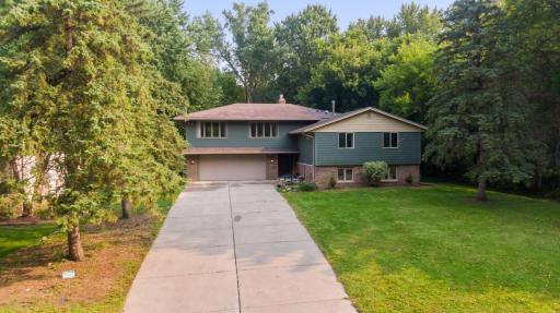 Photo for 899 Millwood Avenue, Roseville, MN 55113 - Listing #6423463 Your new home sits on an oversized .70 acre lot set back from the road with an expansive front yard and privacy on either side! Home features a in-law suite in the lower level and bonus room above the garage!