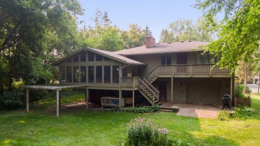 Photo for 899 Millwood Avenue, Roseville, MN 55113 - Listing #6423463 Welcome to your serene back yard with a fabulous screened in porch and lower patio with stairs to the kitchen.