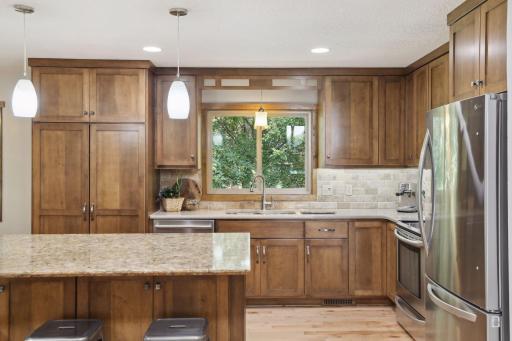 Photo for 899 Millwood Avenue, Roseville, MN 55113 - Listing #6423463 Storage is never an issue in this kitchen, ensuring a clutter-free environment.