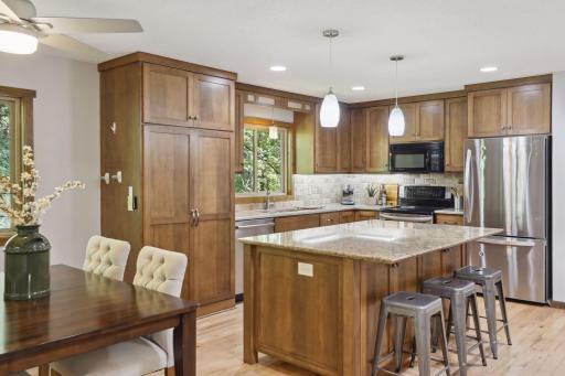 Photo for 899 Millwood Avenue, Roseville, MN 55113 - Listing #6423463 The heart of the home, this kitchen is a symphony of functionality and aesthetics.