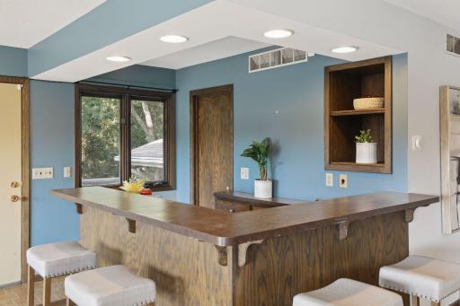 Photo for 899 Millwood Avenue, Roseville, MN 55113 - Listing #6423463 The bar itself serves as the heart of this entertainment haven, boasting a fully equipped setup