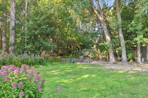 Photo for 899 Millwood Avenue, Roseville, MN 55113 - Listing #6423463 The presence of mature trees and thoughtfully designed landscaping adds to the overall beauty and charm of the property.