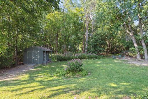 Photo for 899 Millwood Avenue, Roseville, MN 55113 - Listing #6423463 The backyard is a paradise of lush flowering bushes