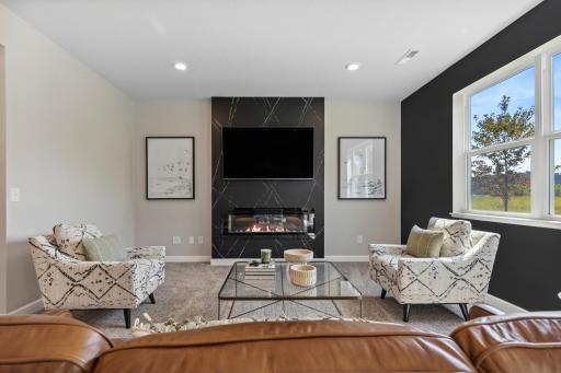This modern electric fireplace is an extraordinary room accent. Enjoy the warmth of the fireplace during the cool fall and winter as you relax in your family room.