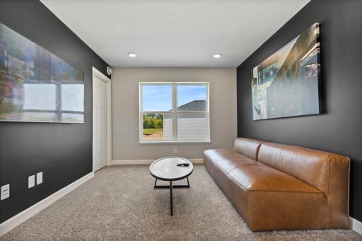Relax, play and enjoy! This upper level game room provides an additional 110 square feet of living space and is conveniently located adjacent to all three of the upper level bedrooms.