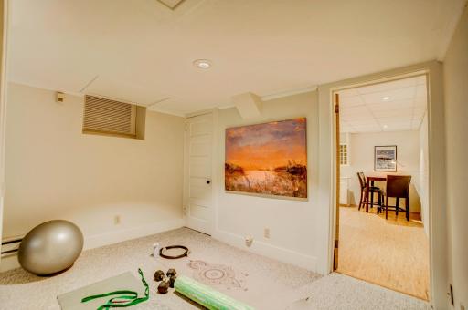 Hobby room with space for exercise equipment