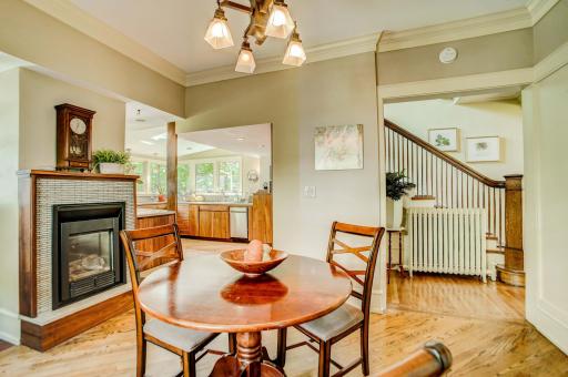 Casual dining area with cozy gas fireplace