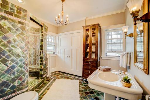 Bath second floor custom tile with concealed laundry area