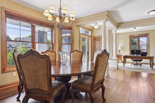 To the right of the foyer is the formal dining room which is illuminated by the soft glow of a chandelier. Ample space to host family and friends.