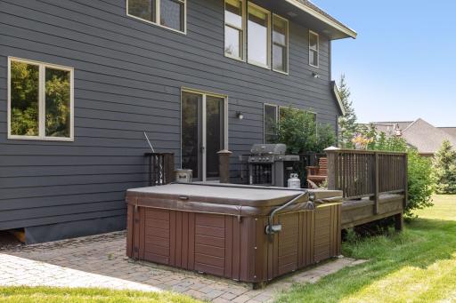 The adjacent hot tub promises relaxation and rejuvenation.