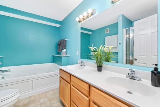 Photo for 16350 Elm Creek Lane, Lakeville, MN 55044 - Listing #6425226 Upper level - Owner's suite bathroom with dual vanity, shower, and jetted tub