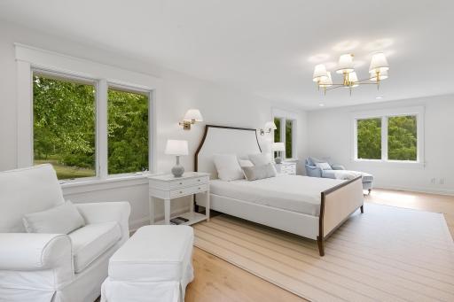 Primary bedroom suite with new hardwood floors