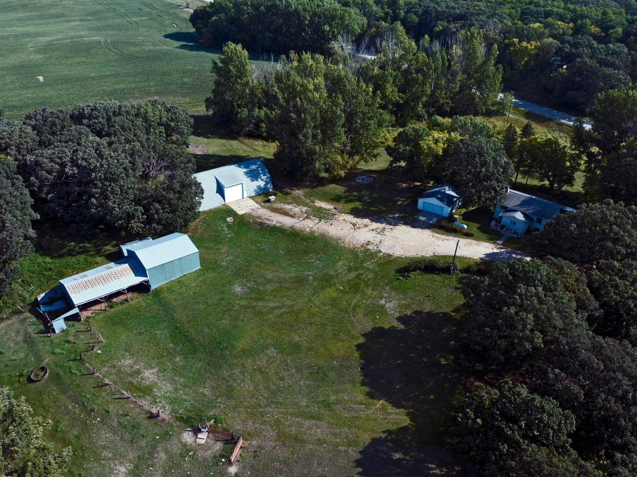 Hay shed on left; quonset in center