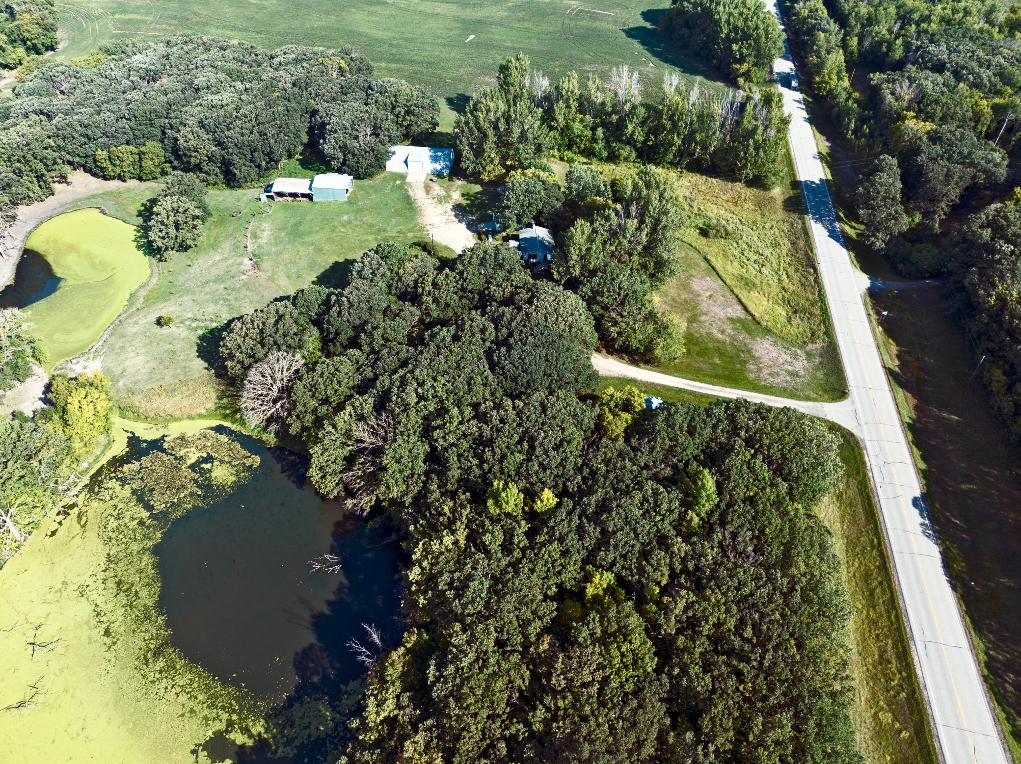 10 acres with portion of pond to the SW of the house