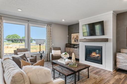 This Lewis features a center gas fireplace to add warmth and elegance to your great room! PICTURE OF MODEL HOME - COLORS AND OPTIONS WILL VARY