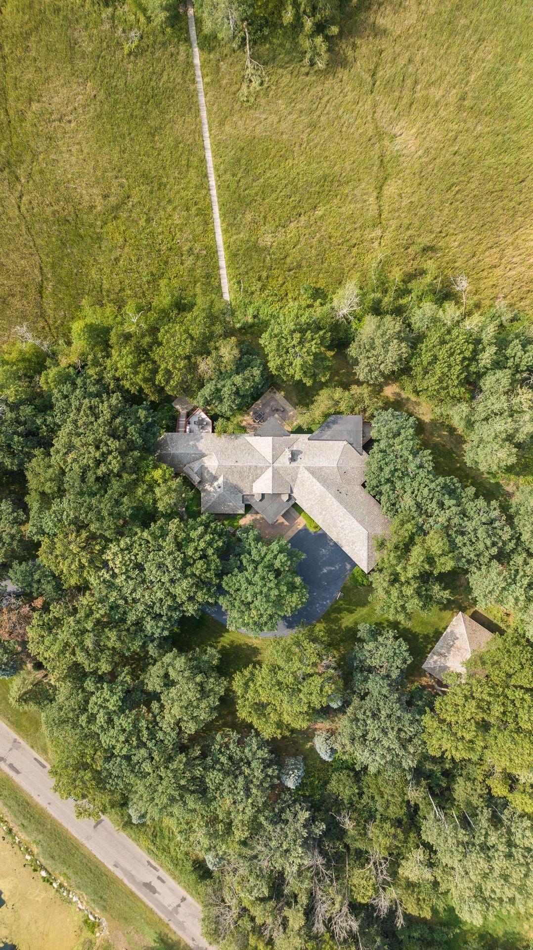 Aerial of home and dock to private island.