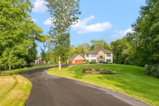 Conveniently located near golf courses, shopping, and dining options, this home offers a peaceful sanctuary with all the conveniences of life. Experience the timeless allure of 9427 Elm Court and make it your forever home.